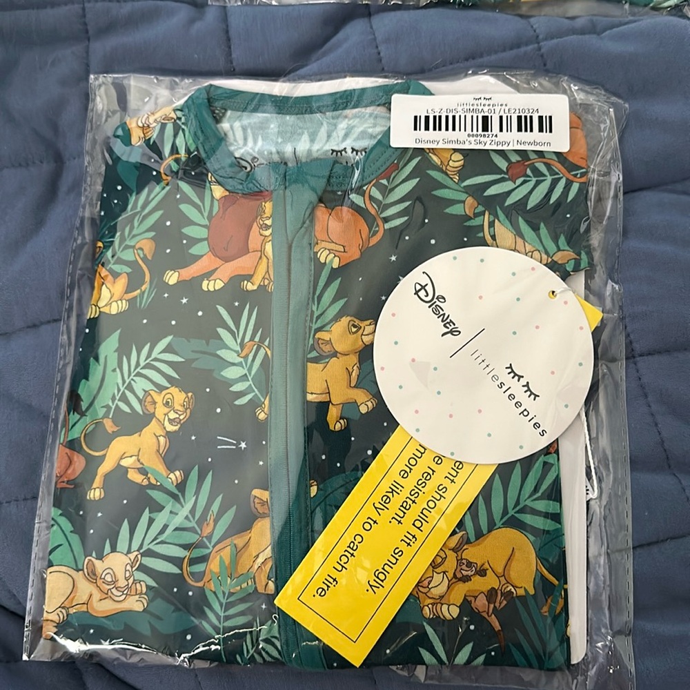 Little Sleepies Newborn Zippy “Simba’s Sky”